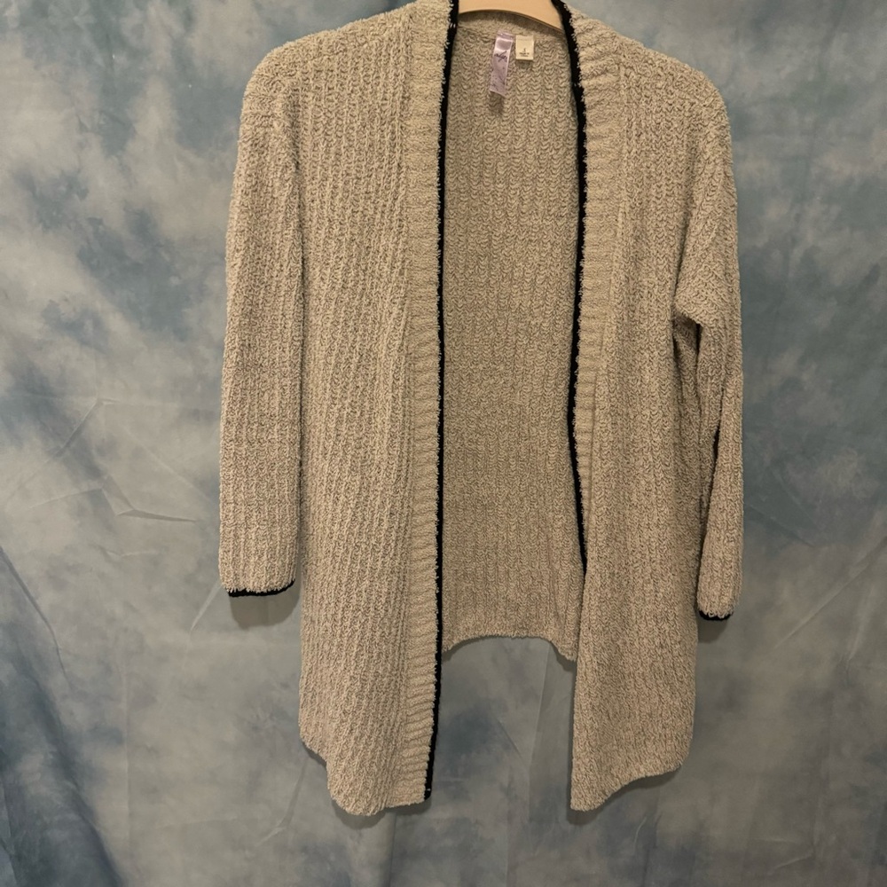 Cozy cream cardigan with black trim
